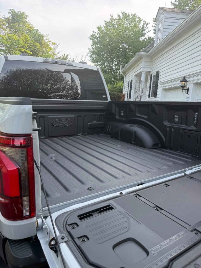 Truck Bed Refresh — finished driveway detailing result